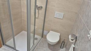 Ванна кімната в Hotel Radnice Dobrovice