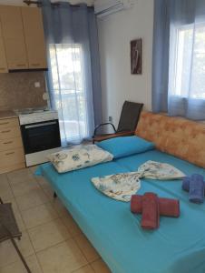 Postel nebo postele na pokoji v ubytování Villa Platskos vol 2 + 31 fotografií