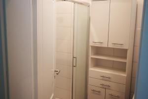 a room with a closet with white cabinets at Helle und moderne Ferienwohnung im Allgäu für 2 Personen in Leutkirch im Allgäu