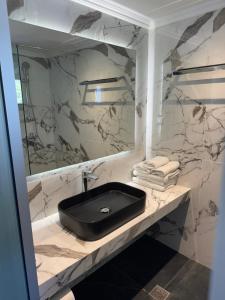 Koupelna v ubytování Assa Maris Beach Hotel
