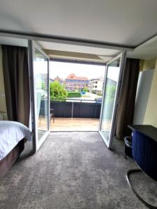 Balkón nebo terasa v ubytování 3 Monkeys Hotel