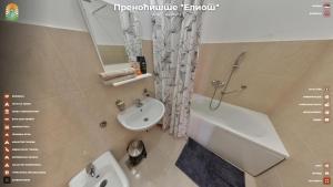 ein Badezimmer mit Waschbecken, Badewanne und Toilette in der Unterkunft Apartmani "Eliot" in Ilino