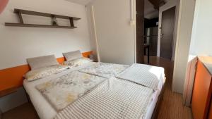 a bedroom with two beds in a room at Zelena Laguna Mobile Homes in Poreč