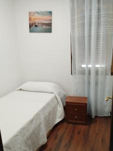 Кровать или кровати в номере Casa de vacaciones en Vigo