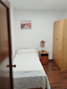 Кровать или кровати в номере Casa de vacaciones en Vigo