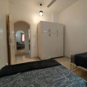 Ένα ή περισσότερα κρεβάτια σε δωμάτιο στο Luxor Palm Villa +37 φωτογραφίες