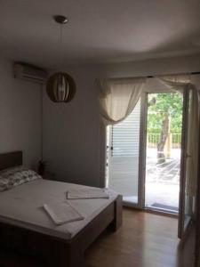 Letto o letti in una camera di Under the Fig tree