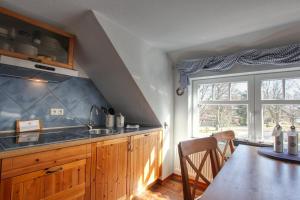 Küche/Küchenzeile in der Unterkunft Landhaus am Ufer - Wohnung 4