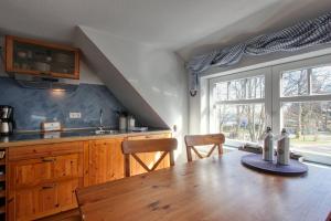 Küche/Küchenzeile in der Unterkunft Landhaus am Ufer - Wohnung 4
