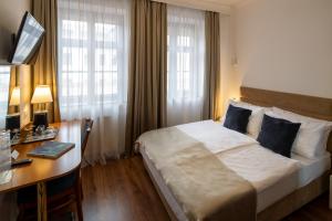 Postel nebo postele na pokoji v ubytování Fonte Hotel