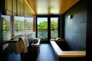 Posezení v ubytování Hangzhou Chunzhiwu Hot Spring Hotel