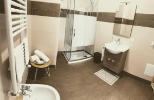 a bathroom with a sink and a shower at Alba b&b in Polignano a Mare