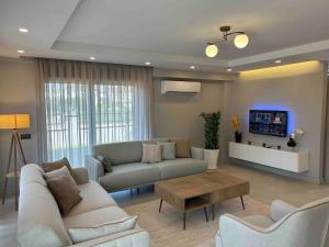 Televisyen dan/atau pusat hiburan di Nirvana Belek Villas Manolya
