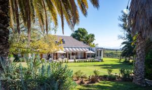 Κήπος έξω από το De Denne Country Guest House