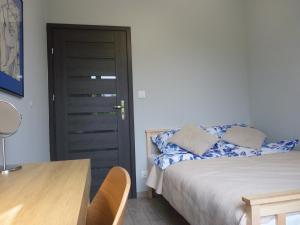 Ένα ή περισσότερα κρεβάτια σε δωμάτιο στο Apartament Glatz - na Letniej Kłodzko