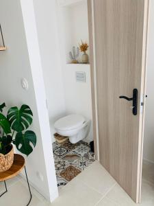 Koupelna v ubytování Logement cosy en centre ville + 26 fotografií