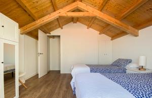 Postel nebo postele na pokoji v ubytování SOCAIRO