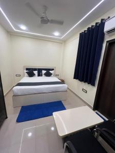 Postel nebo postele na pokoji v ubytování Hotel Hayat Inn