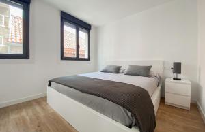 Postel nebo postele na pokoji v ubytování SOCAIRO