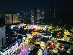 a view of a city at night with lights at Layflat Hotel in Shenzhen