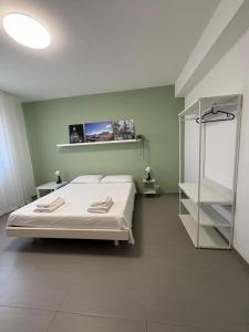 Postel nebo postele na pokoji v ubytování Casa Rogos