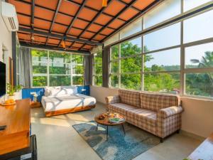 A seating area at The Hosteller Bam Goa, Saligao - Poshtel
