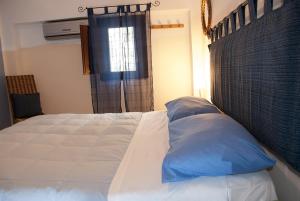 Katil atau katil-katil dalam bilik di Bed And Breakfast Maria