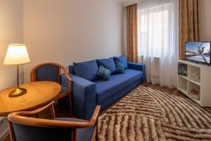 TV a/nebo společenská místnost v ubytování Fonte Hotel