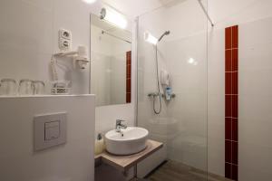 Koupelna v ubytování Fonte Hotel