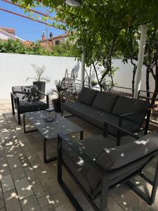 Patio nebo venkovní prostory v ubytování Two Flowers Luxury Apartment