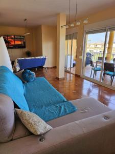a living room with a couch and a pool table at Miradol del Sol in La Nucía