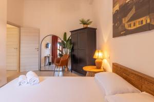 Postel nebo postele na pokoji v ubytování Travel B&B