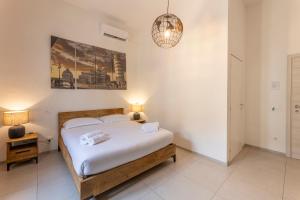 Postel nebo postele na pokoji v ubytování Travel B&B