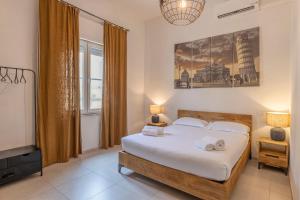Postel nebo postele na pokoji v ubytování Travel B&B + 37 fotografií