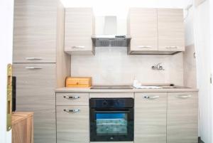 Køkken eller tekøkken på Villa Maria Apartment + 27 billeder