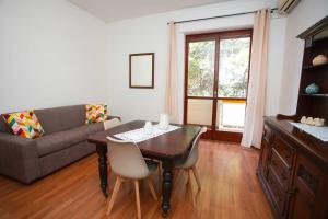 Et opholdsområde på Villa Maria Apartment