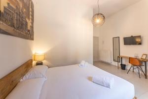 Postel nebo postele na pokoji v ubytování Travel B&B
