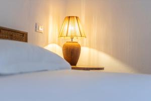 Postel nebo postele na pokoji v ubytování Travel B&B
