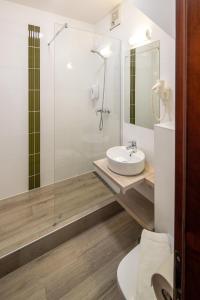 Koupelna v ubytování Fonte Hotel