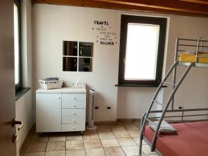A bed or beds in a room at PudApartment Holiday Home