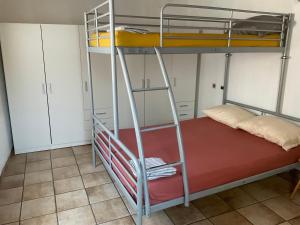 A bed or beds in a room at PudApartment Holiday Home