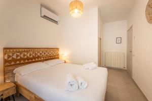 Postel nebo postele na pokoji v ubytování Travel B&B