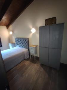 Postel nebo postele na pokoji v ubytování La Villa del Barranco