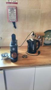 a coffee maker sitting on top of a counter at Casa Dominó in Aldeia do Mato +12 photos