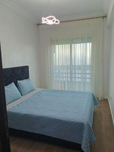 Ένα ή περισσότερα κρεβάτια σε δωμάτιο στο Studio meublé