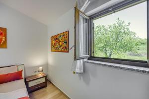Postel nebo postele na pokoji v ubytování Grad Inn Apartments & Resort