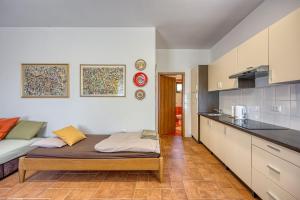 Kuchyň nebo kuchyňský kout v ubytování Grad Inn Apartments & Resort