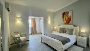 Katil atau katil-katil dalam bilik di Laranjal by Check-in Portugal +39 gambar