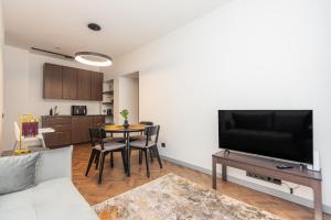 Μια τηλεόραση ή/και κέντρο ψυχαγωγίας στο D21 Apartamentai