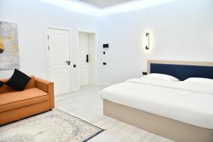 Postel nebo postele na pokoji v ubytování QUT Hotel